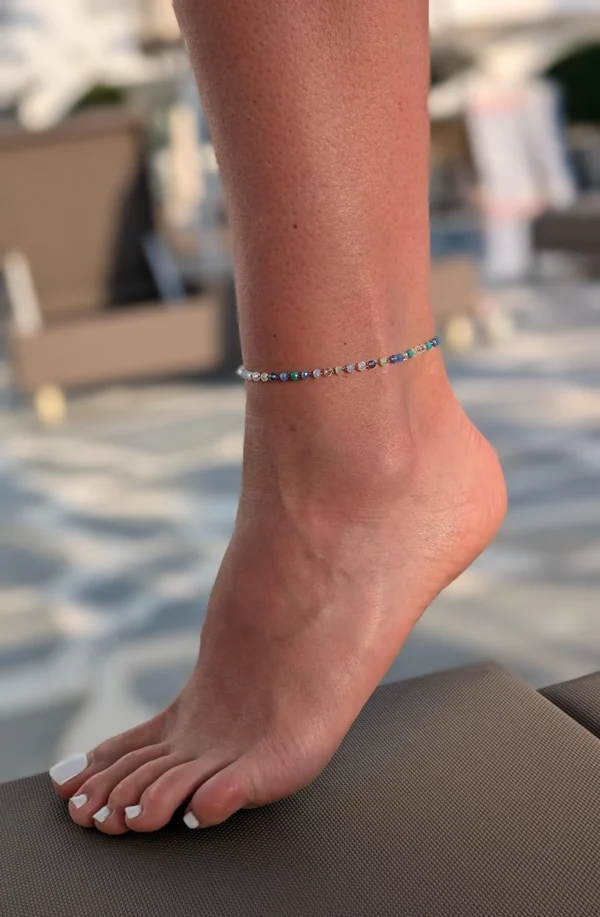 kojos grandinele kristalai