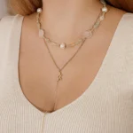 rožinis kvarcas, prehnitas, citrinas, kalnų krištolas, upiniai perlai